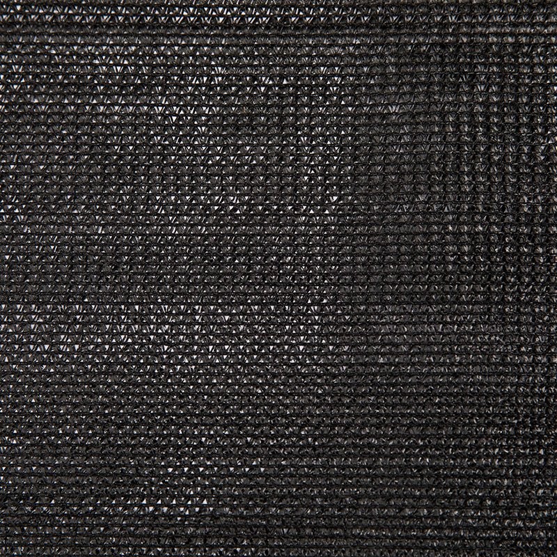 Close view of the black tape HDPE shade mesh weave in a flat close view