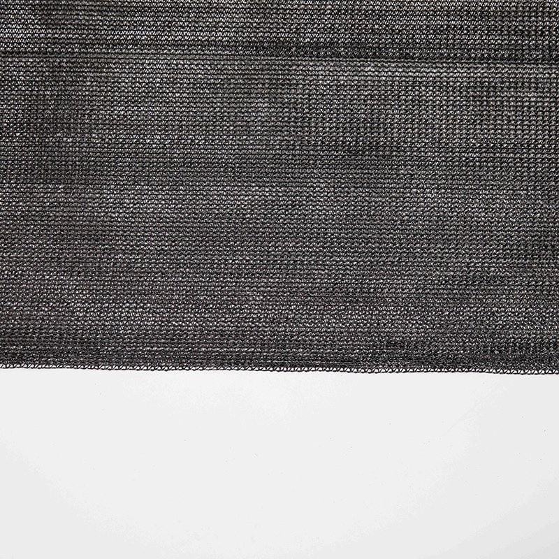Black tape HDPE shade net mesh fabric with the lower edge against a white background