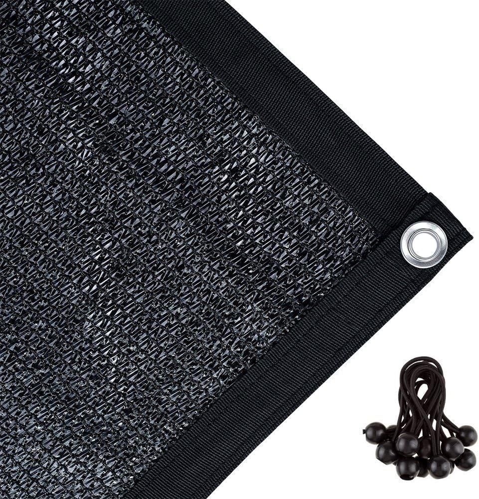Corner of a black HDPE shade cloth with a metal eyelet and rope