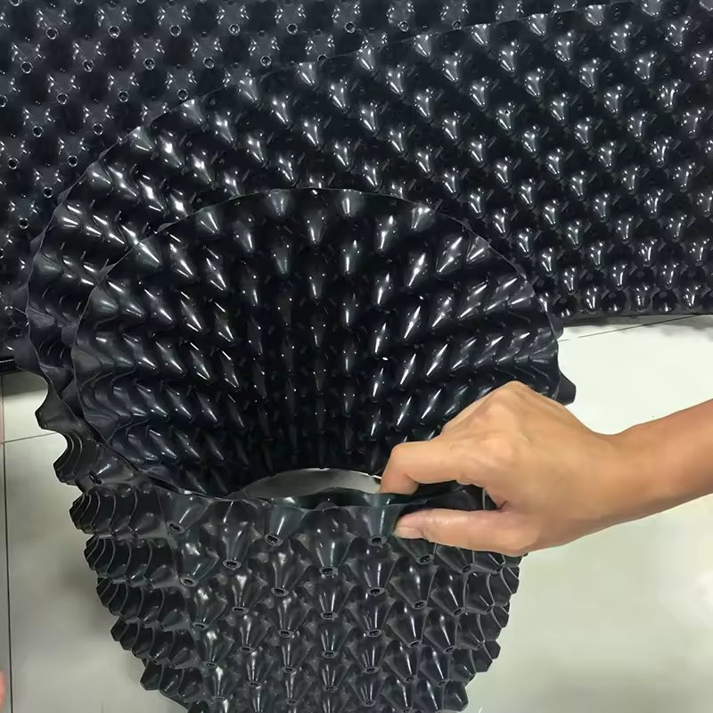 Assembling a root control container by hand, cone openings facing inward