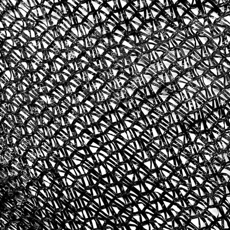 Close-up of knitted shade net mesh showing the thread structure