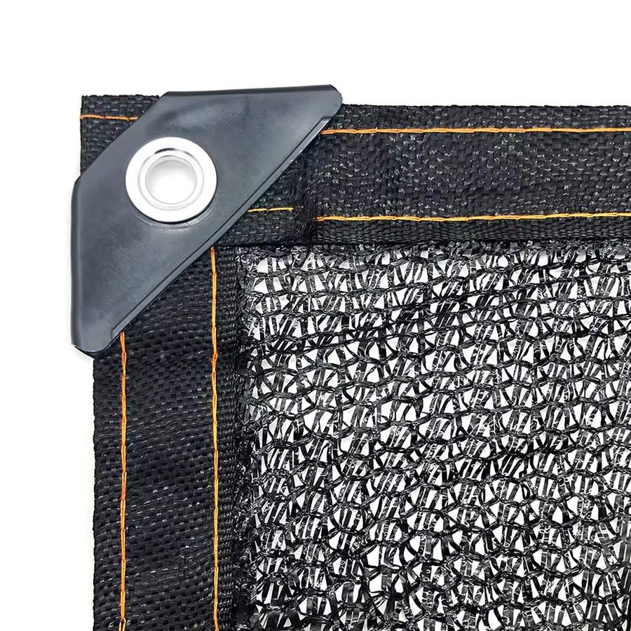 Reinforced edge and grommet on a shade net panel