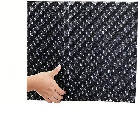 close view of the air pruning panel surface under hand