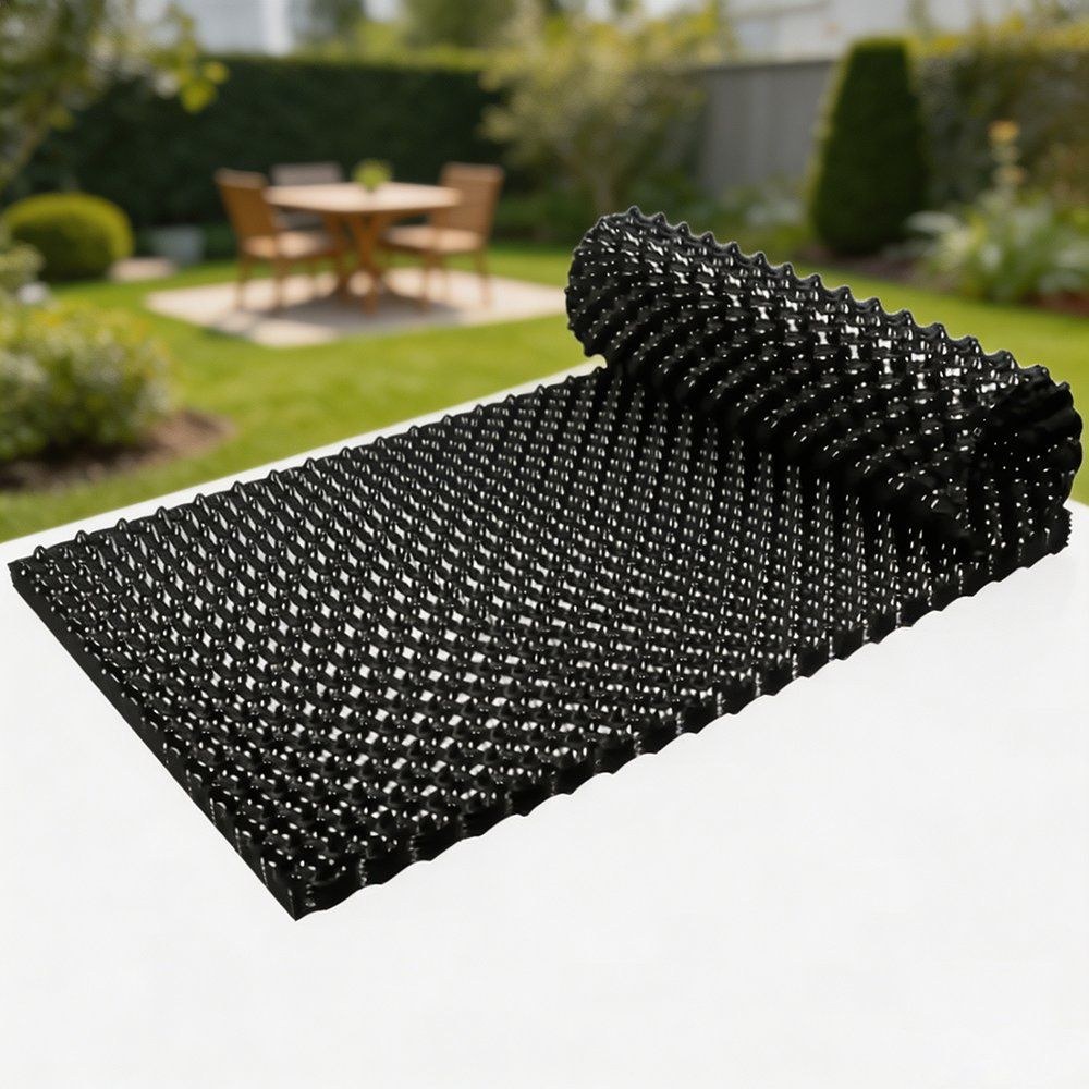 air pruning pot panels flat and partly rolled on a stone path