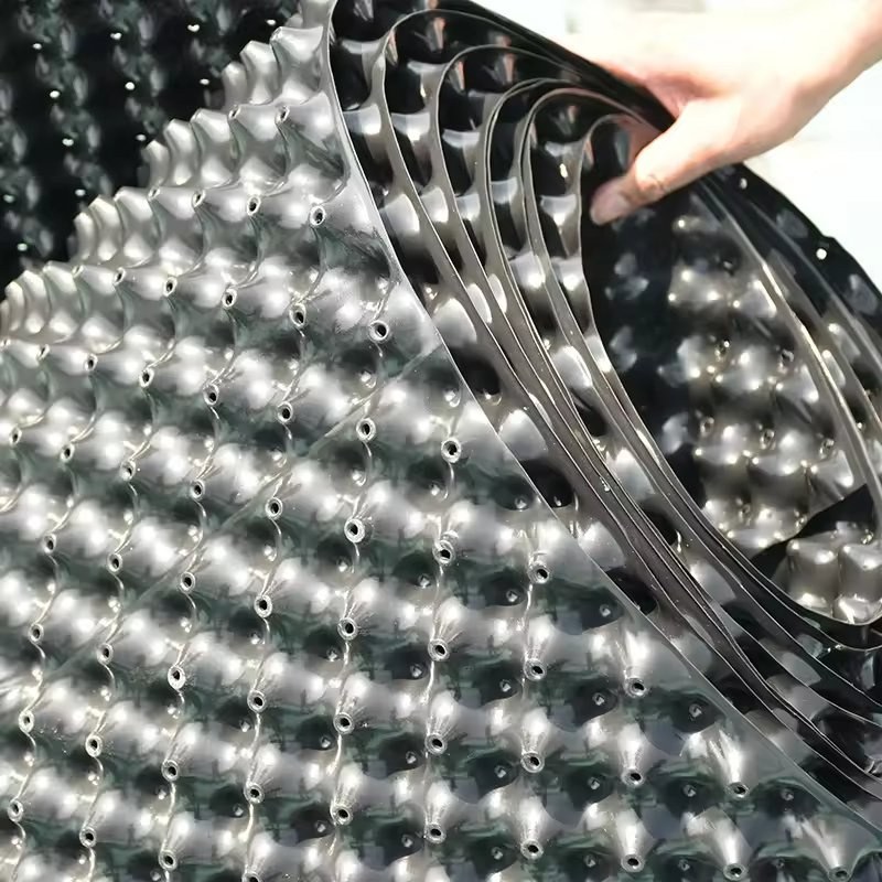 flexible studded panel of an air pruning pot in two colours