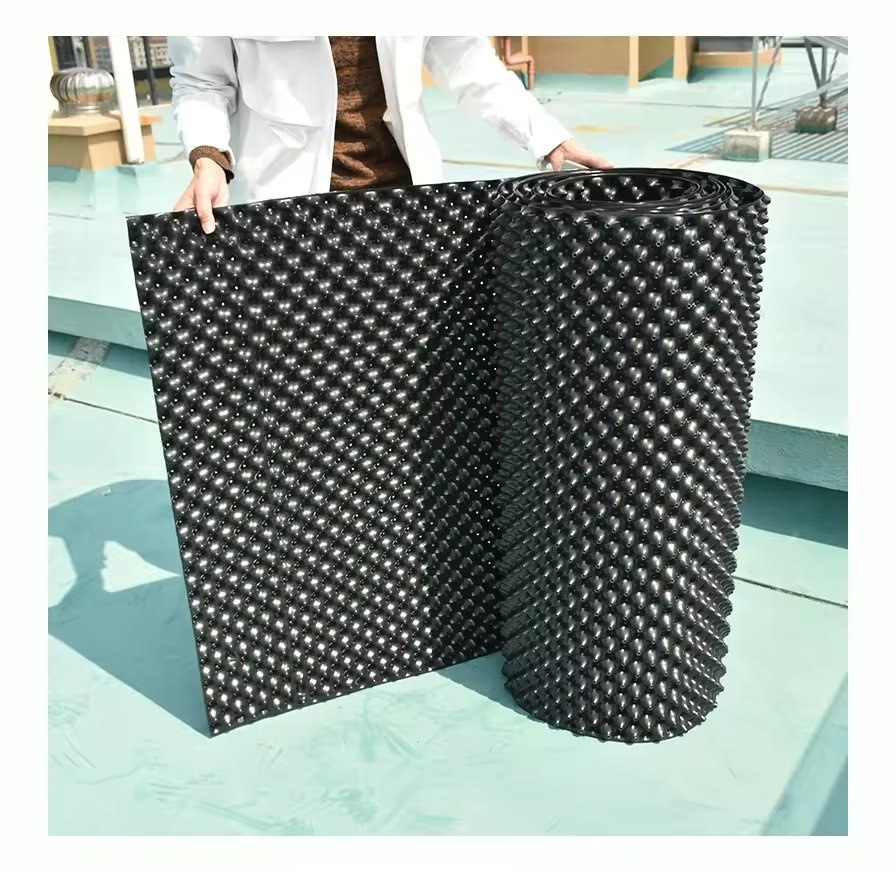 large air pruning pot panel being handled by two people
