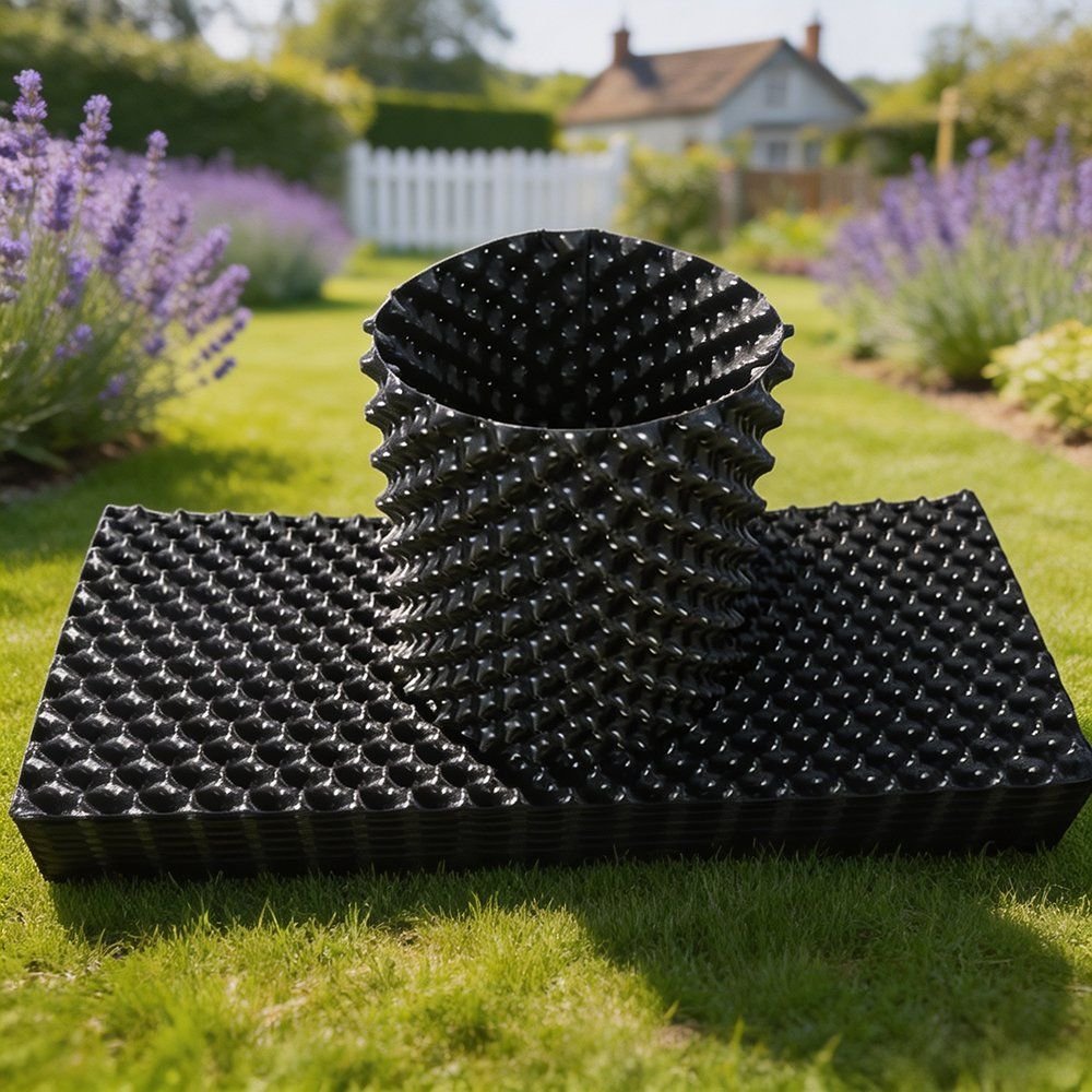 air pruning root controller pot standing beside flat panels on grass