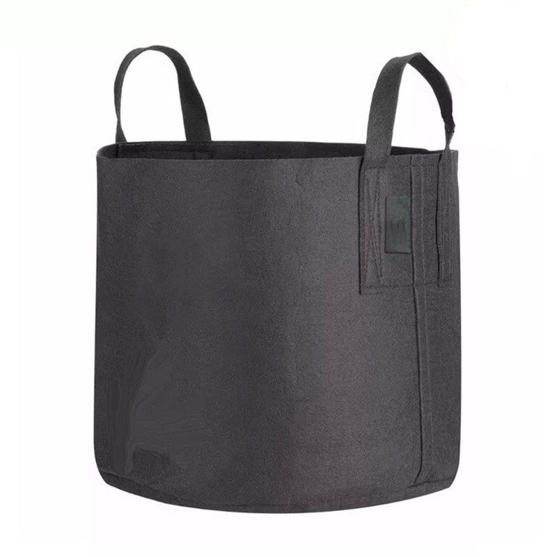 black felt potato grow bag with stitched handles seen upright