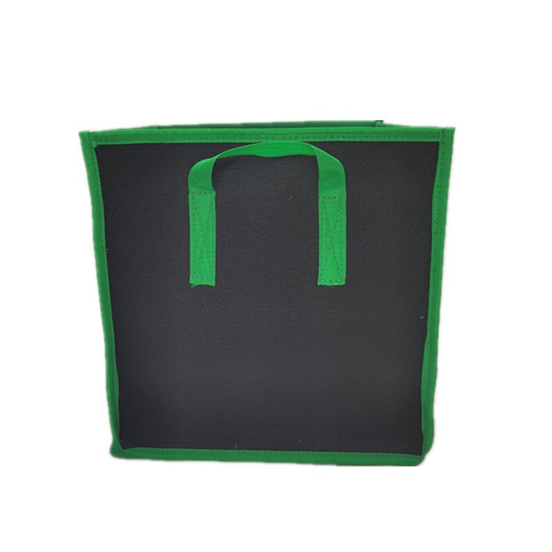 square nonwoven grow pot seen from the front in dark green