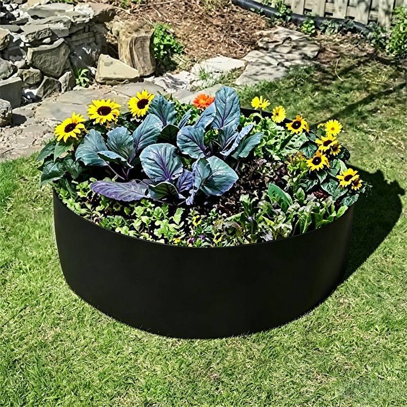 round felt raised bed planted with vegetables flowers and sunflowers on grass